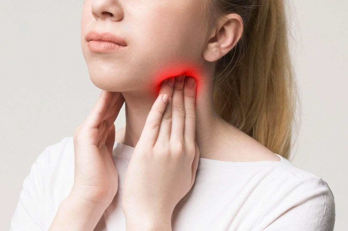 stock-photo-woman-with-thyroid-gland-problem-touching-her-neck-closeup-panorama-1371548546-transformed